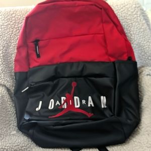 Red and black Jordan backpack.new with tag